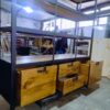Estantería industrial de herrería y madera a medida fabricada en Bariloche.